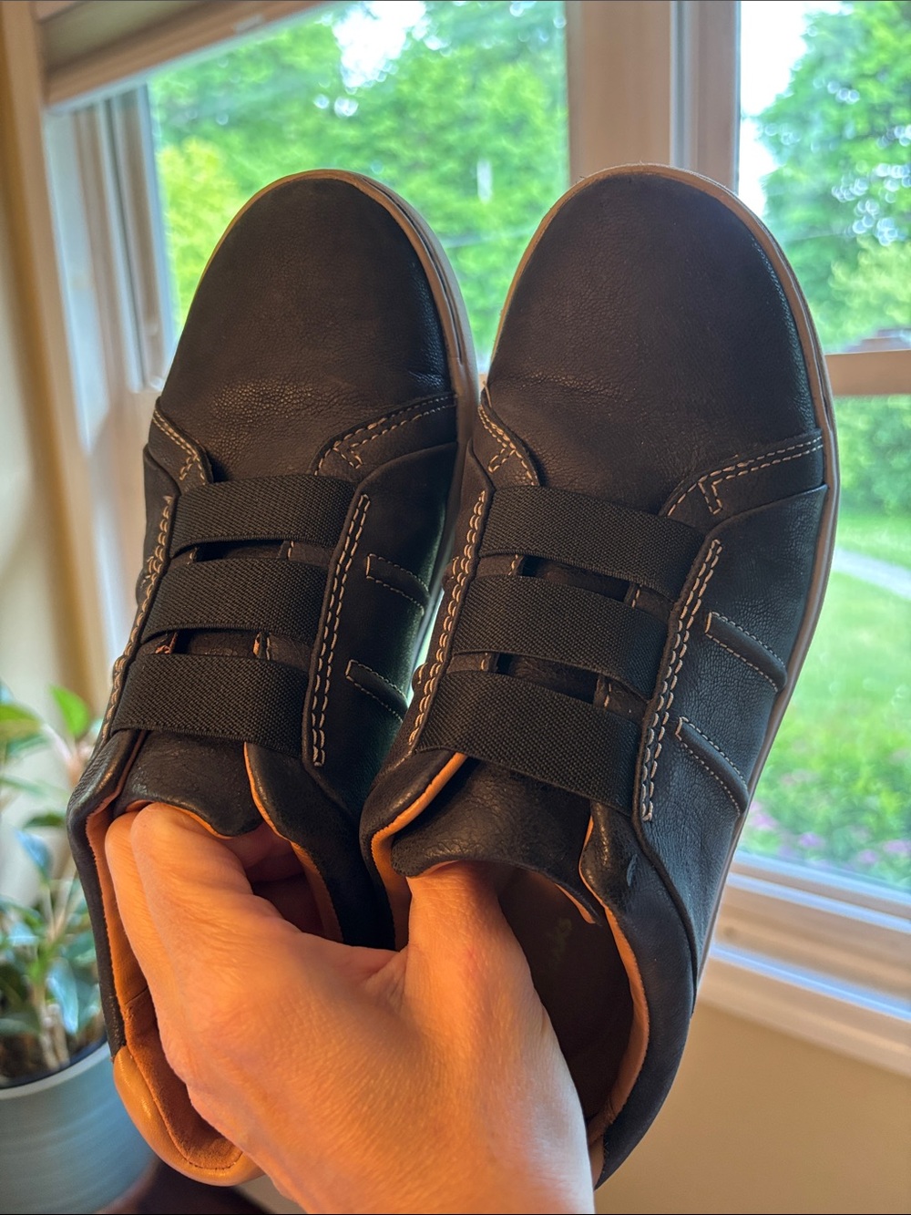 Clarks Black Slip-on Sneakers with Tan Accents